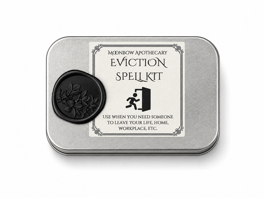 Eviction Spell Kit ritual tin with black botanical wax seal