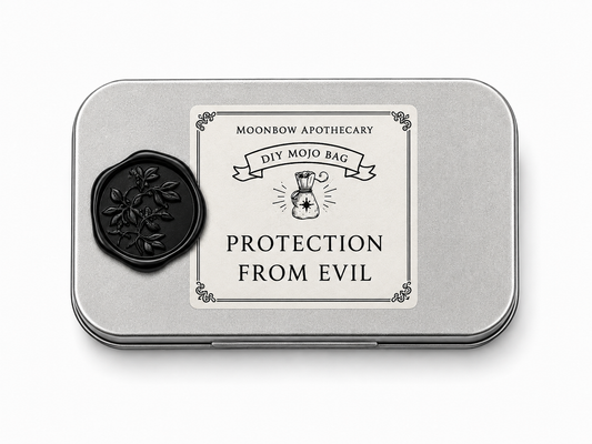DIY Mojo Bag Protection From Evil ritual tin with black botanical wax seal