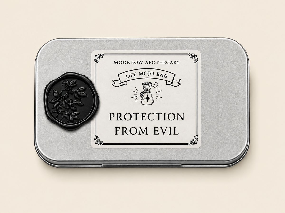 DIY Mojo Bag Protection From Evil ritual tin with black botanical wax seal